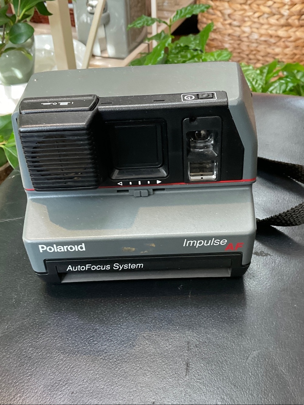 Polaroid Impulse AF Instant Camera — Gray with Black Accents and Red Trim
